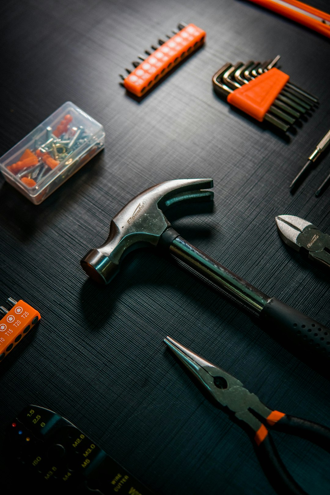 a-group-of-tools-lay-on-a-table-z-pl41jt3ra